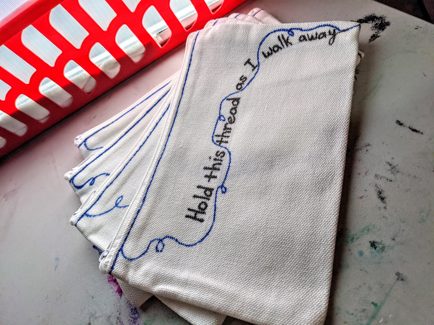 Weezer - The Sweater Song - zipper pouch - Watch me unravel - village of the weird