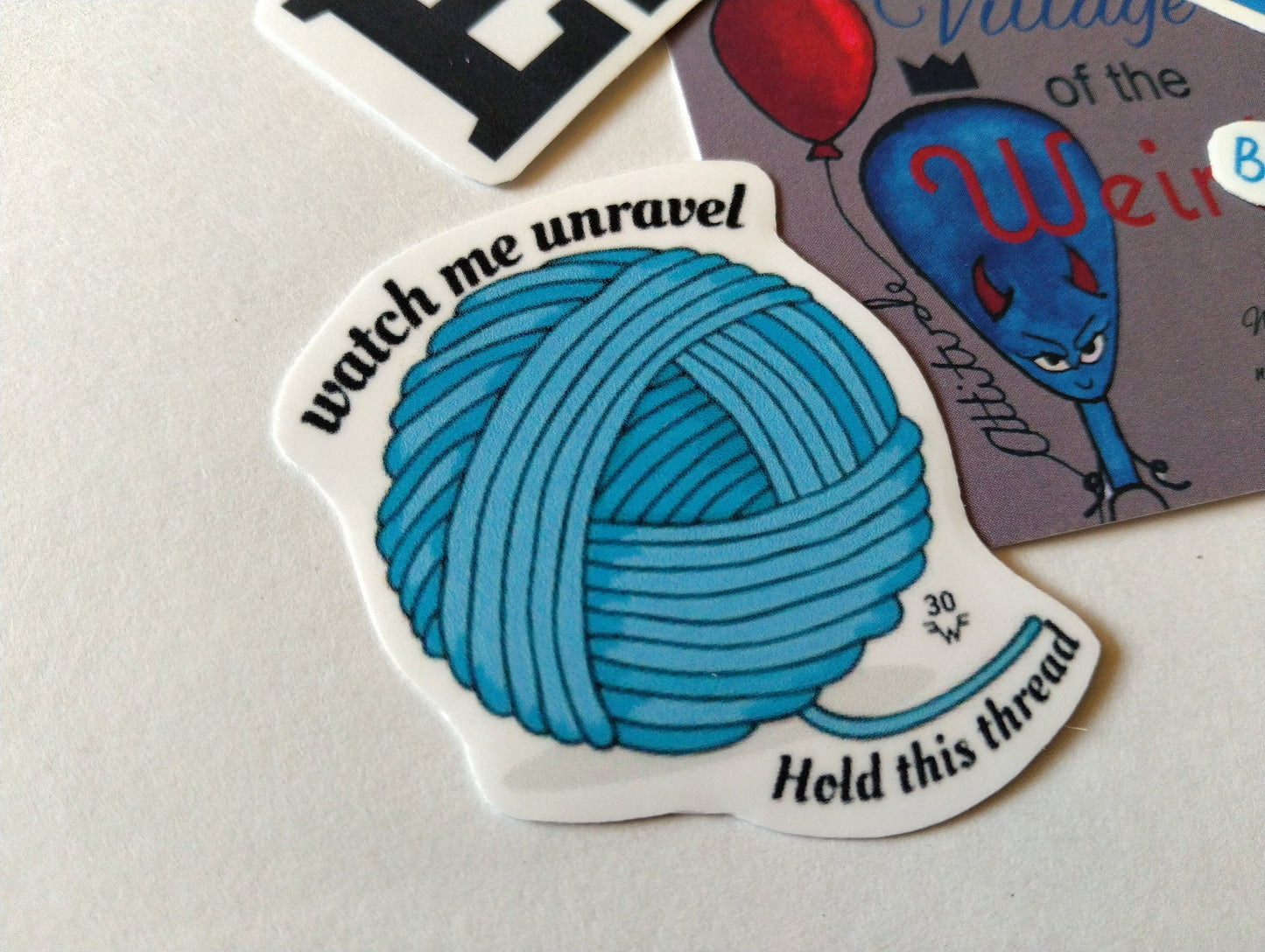 Weezer - The Sweater Song - sticker - Watch me unravel - village of the weird